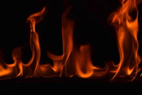 Fire flames on black background Stock Photos