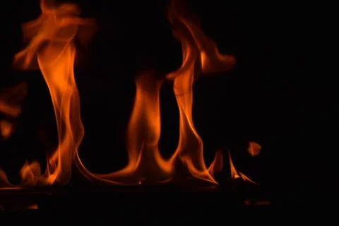 Fire flames on black background Stock Photos