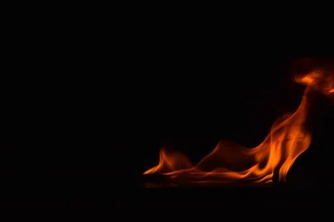 Fire flames on black background Stock Photos