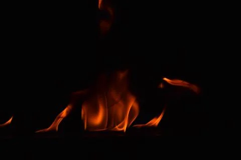 Fire flames on black background Stock Photos