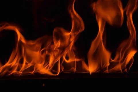 Fire flames on black background Stock Photos