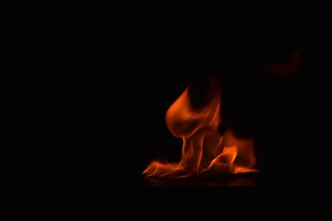 Fire flames on black background Stock Photos