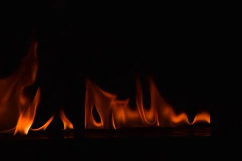 Fire flames on black background Stock Photos
