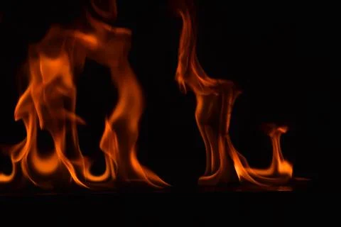 Fire flames on black background Stock Photos