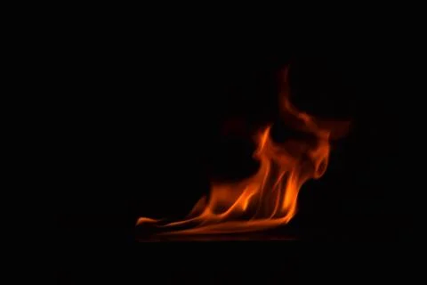 Fire flames on black background Stock Photos