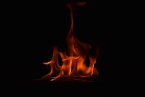 Fire flames on black background Stock Photos