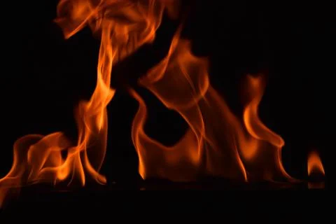 Fire flames on black background Stock Photos