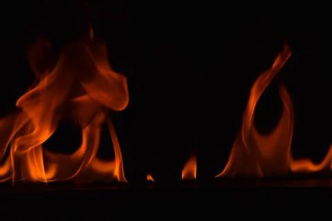 Fire flames on black background Stock Photos