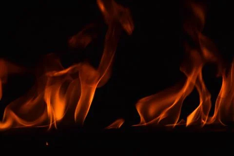 Fire flames on black background Stock Photos