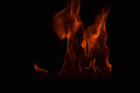 Fire flames on black background Stock Photos