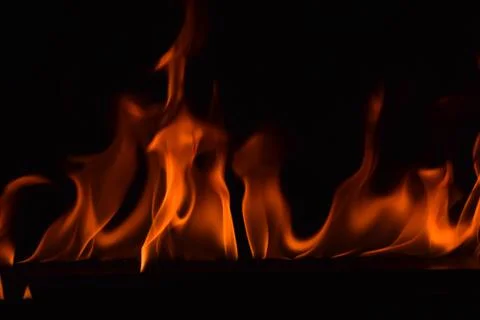 Fire flames on black background Stock Photos