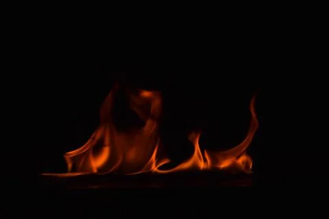 Fire flames on black background Stock Photos