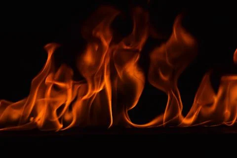 Fire flames on black background Stock Photos