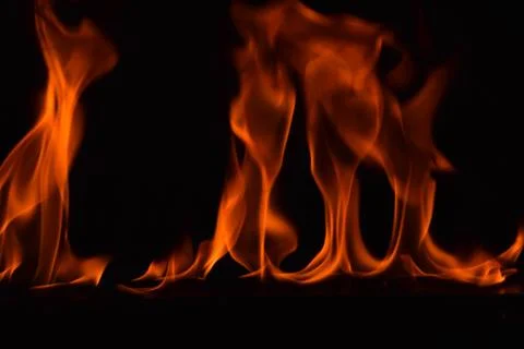 Fire flames on black background Stock Photos