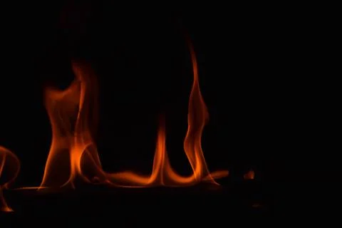 Fire flames on black background Stock Photos