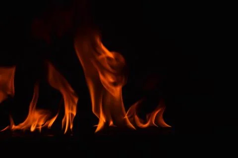 Fire flames on black background Stock Photos