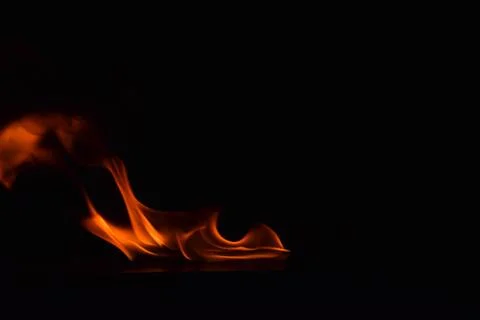 Fire flames on black background Stock Photos