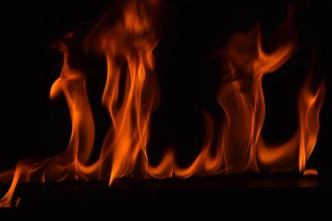 Fire flames on black background Stock Photos