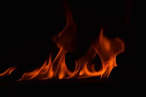 Fire flames on black background Stock Photos