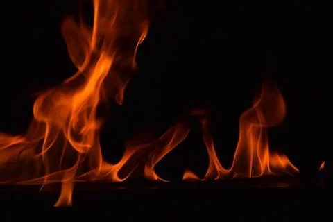 Fire flames on black background Stock Photos