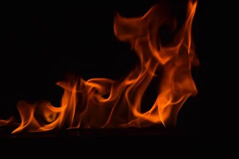 Fire flames on black background Stock Photos