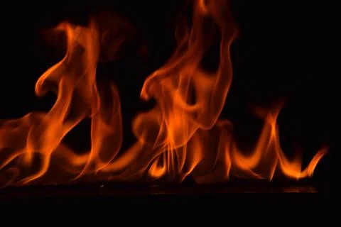 Fire flames on black background Stock Photos