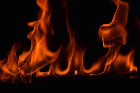 Fire flames on black background Stock Photos