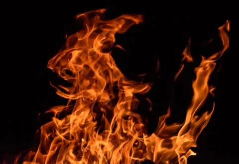 Fire flames on black background Stock Photos