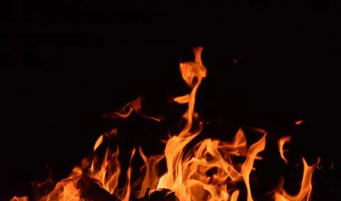 Fire flames on black background Stock Photos