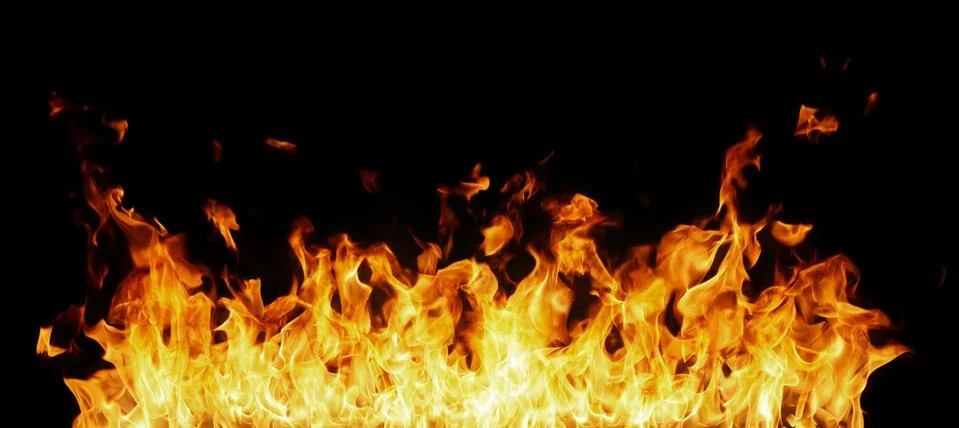 Fire flames on black background Stock Photos