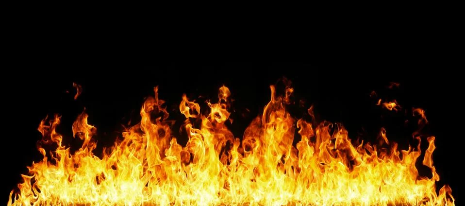 Fire flames on black background. Stock Photos