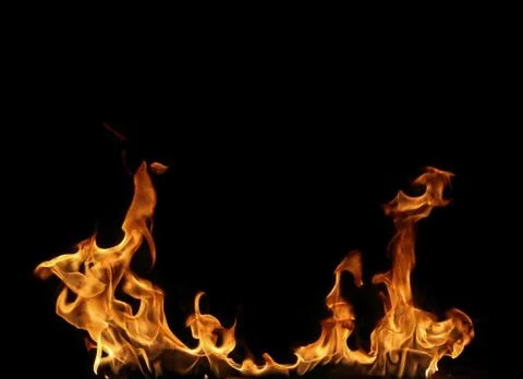 Fire flames on black background. Stock Photos
