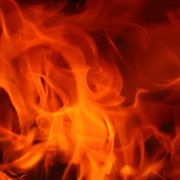 Fire flames on black background. Stock Photos