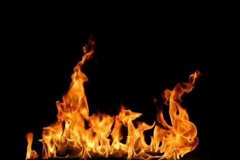Fire flames on black background. Stock Photos