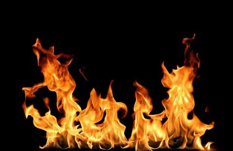 Fire flames on black background. Stock Photos