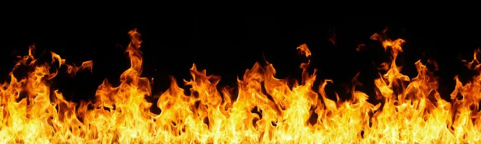 Fire flames on black background. Stock Photos