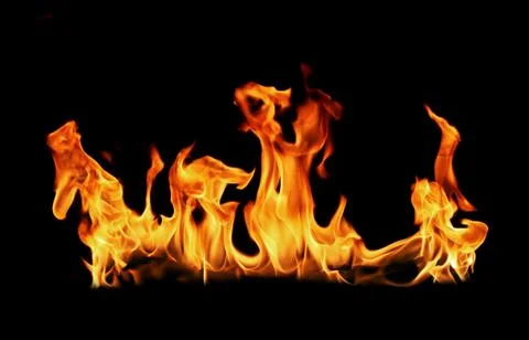 Fire flames on black background. Stock Photos