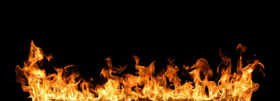 Fire flames on black background. Stock Photos