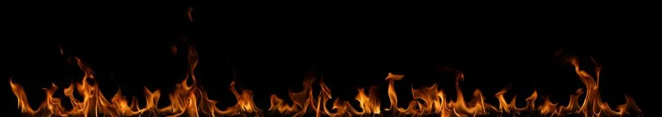 Fire flames on black background. Stock Photos