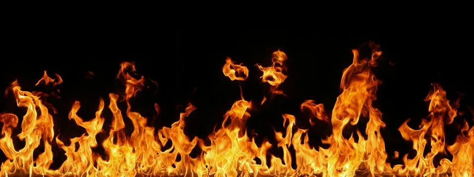 Fire flames on black background. Stock Photos