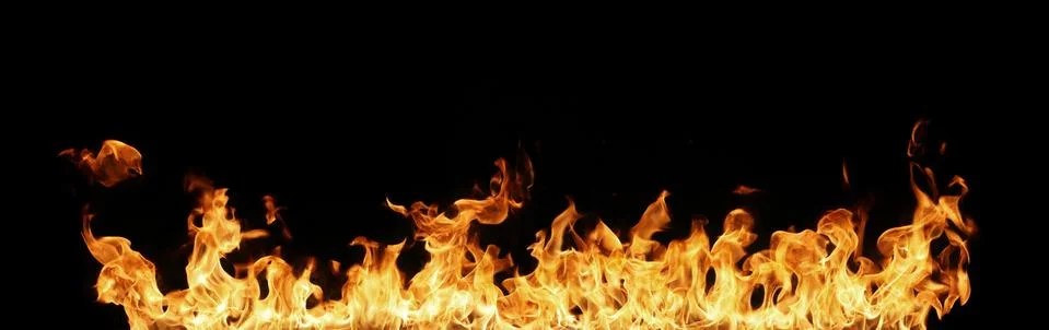 Fire flames on black background. Stock Photos