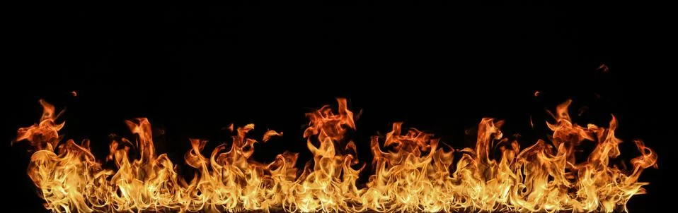 Fire flames on black background. Stock Photos