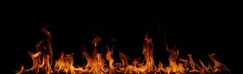 Fire flames on black background. Stock Photos
