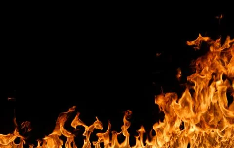 Fire flames on black background. Stock Photos