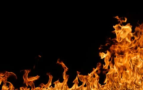 Fire flames on black background. Stock Photos