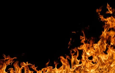 Fire flames on black background. Stock Photos