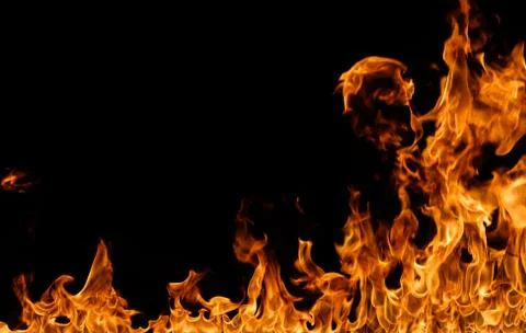 Fire flames on black background. Stock Photos