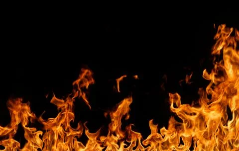 Fire flames on black background. Stock Photos