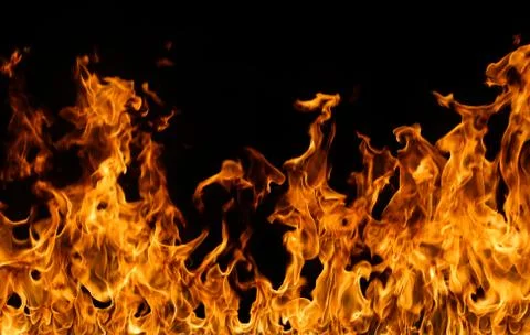 Fire flames on black background. Stock Photos