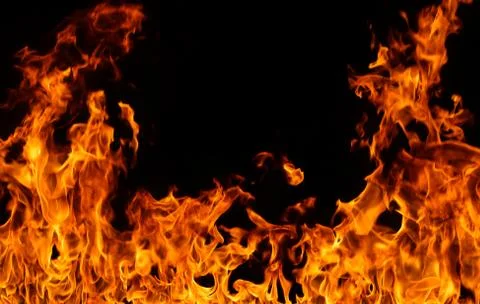 Fire flames on black background. Stock Photos